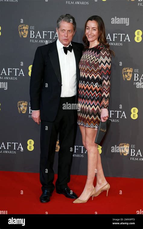 Hugh Grant And Anna Elisabet Eberstein Attend The 2024 Ee Bafta Film Awards At The Royal