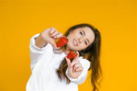 Premium Photo Closeup Of A Sexy Female Eating Fresh Strawberry Sexual