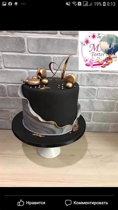 Elegant Black And Silver Birthday Cake With Gold Decorations