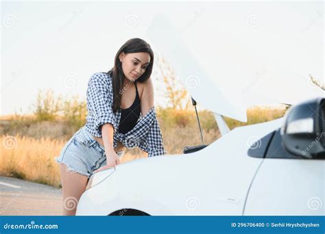 Beautiful Woman Near A Broken Car Confused Woman Does Not Know What To