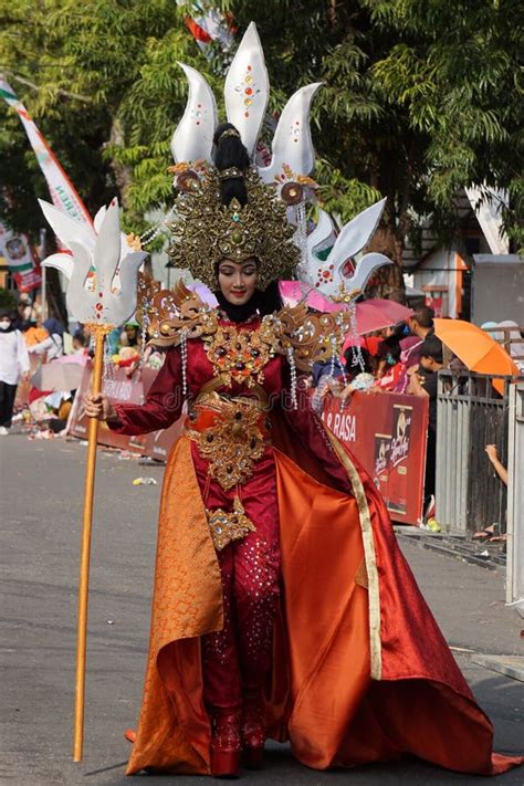 Indonesian With An Exotic Costume From Riau At Ben Carnival Editorial