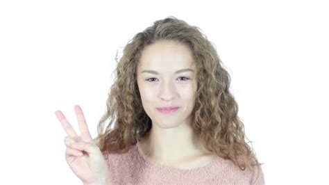 Portrait Of Beautiful Woman Showing Victory Sign Stock Footage Videohive