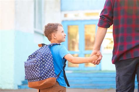 Premium Photo Dad Walks His Son To School