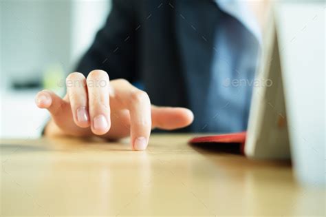 Anxious Woman Impatiently Tapping Fingers On Her Office Desk Stock