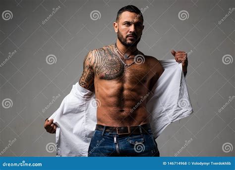 Tattoo Male Artist Makes A Tattoo On A Female Leg Royalty Free Stock