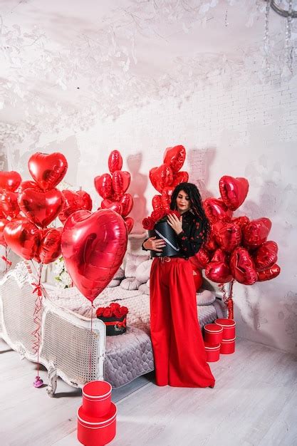 Premium Photo Sexy Brunette With Balloons Heart And Roses