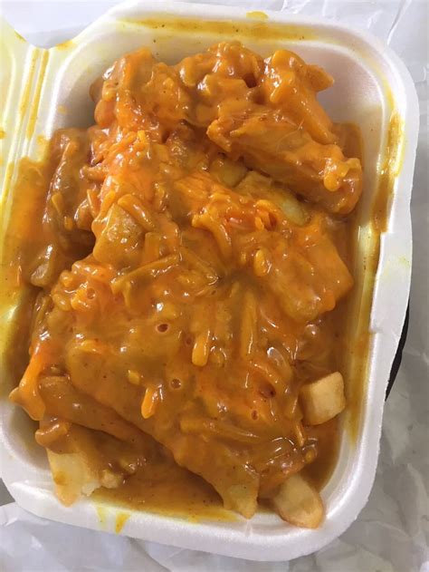 Scottish dish: Chips, cheese and curry sauce : shittyfoodporn