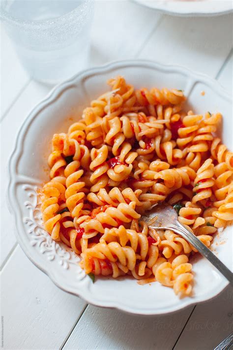 Pasta With Tomato Sauce By Stocksy Contributor Davide Illini Stocksy