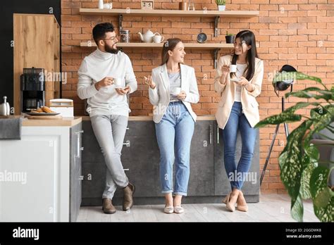 People Having Coffee Break In Office Stock Photo Alamy
