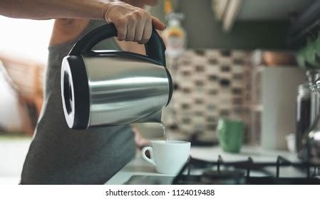 2.019 Pouring Tea Kettle Close Images, Stock Photos & Vectors | Shutterstock