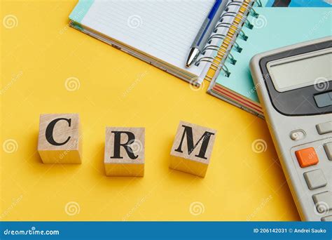 CRM Customer Relationship Management Inscription On Cubes Stock Image