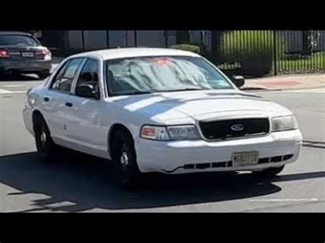 Unmarked Paterson Police Crown Vic Responding Code Through Heavy