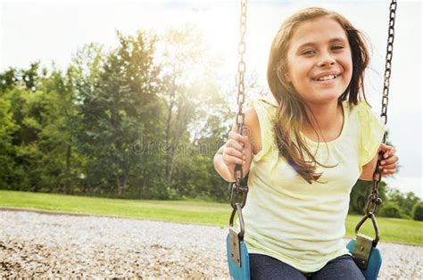 Girl Portrait And Smile With Nature Swing And Park For Outdoor Fun