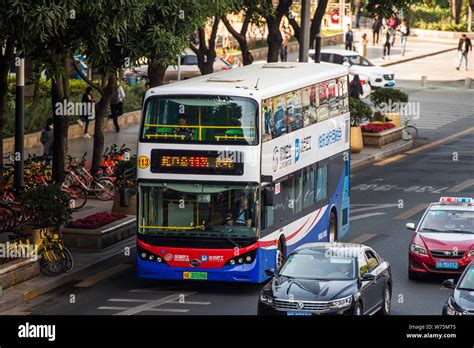 --FILE--A BYD electric double-decker bus travels on a road in Shenzhen ...