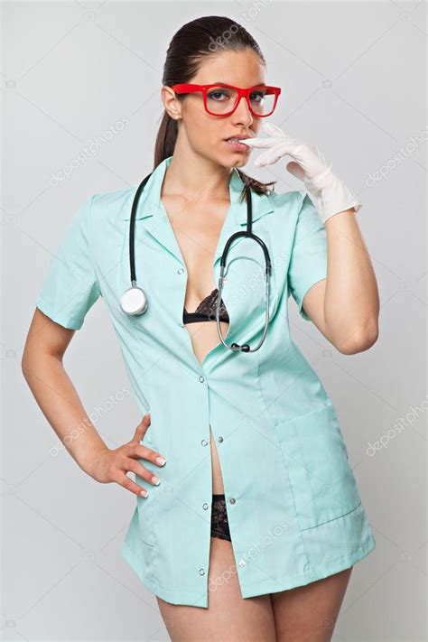 Sexy Woman Doctor With A Stethoscope And Red Glasses Stock Photo By