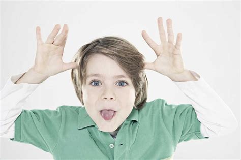 Boy 8 9 Pulling Funny Faces Close Up Portrait Stock Photo