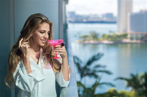 Beautiful Blonde Woman Enjoy Drink Coctail At Terrace Balcony On Summer Vacation Time Elegant