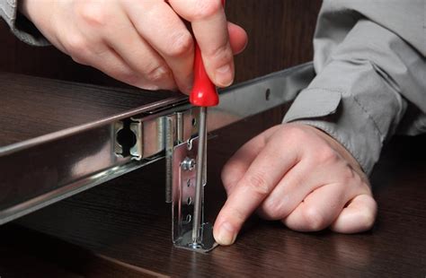 Premium Photo Midsection Of Man Using Screwdriver While Repairing