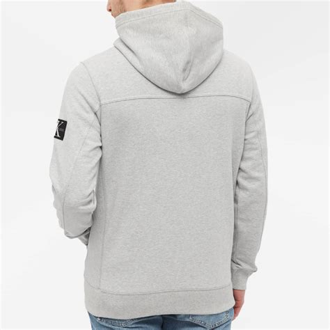 Calvin Klein Monogram Sleeve Badge Hoodie Light Grey Heather End