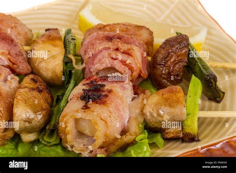 Bacon Wrapped Grilled Scallops With Mushrooms And Bacon Stock Photo Alamy
