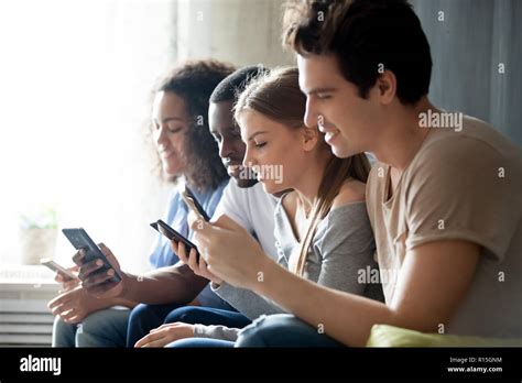 Diverse Young People Girls Guys Sitting In Row Friends Gathered