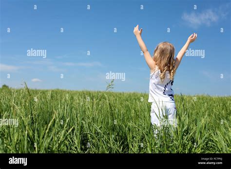 little girl outdoors in sunny summer day Stock Photo - Alamy