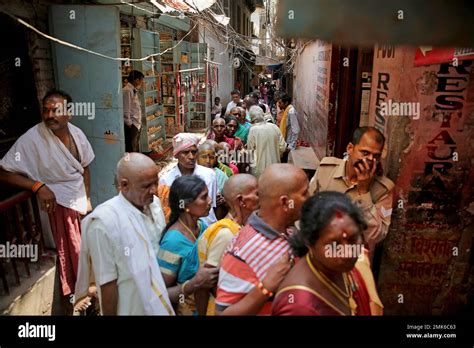 In This March Photo Hindu Devotees Stand In Queue In A