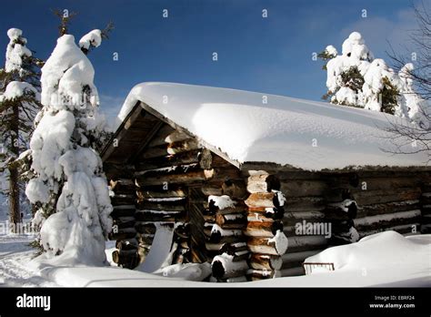 snow covered log cabin, Finland, Lapland Stock Photo, Royalty Free ...