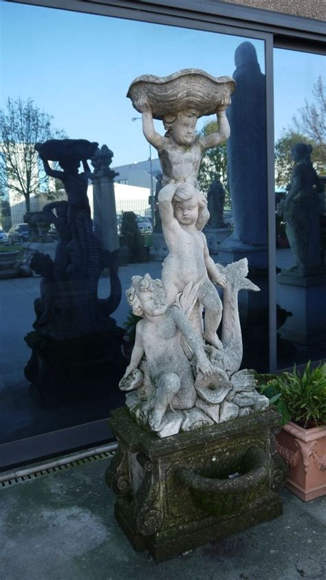 Scultura In Pietra Composizione Putti Con Tritone