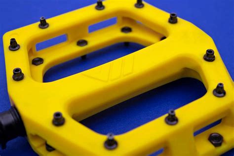 dmr  mtb pedals deliver grippy pins durability performance