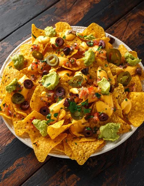 Mexican Nachos Tortilla Chips With Olives Jalapeno Guacamole