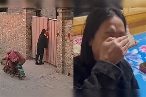 2只狗狗在院子里打架，门外女子停车看热闹，当场被撞出一个大包