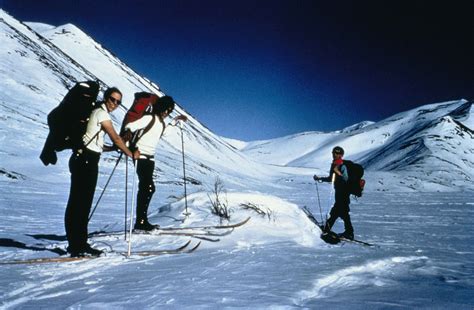 Filerecreational Skiers In The Mountains Take Breaks And Enjoy Skiing