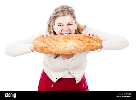 Hungry Woman Holding And Biting Loaf Of Bread Isolated On White