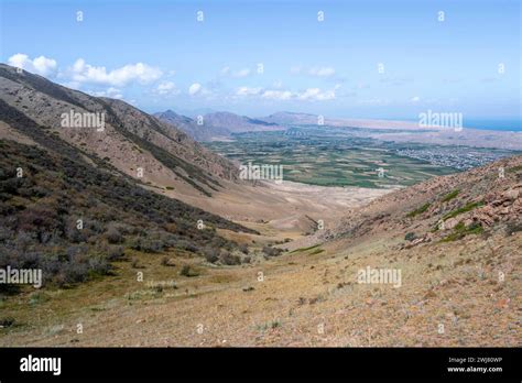 Dry Mountain Landscape And Lake Issyk Kul Near Kysyl Suu Kyrgyzstan