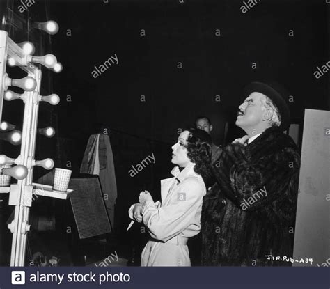 Dolores Del Rio And Orson Welles Check Their Costumes And Make Up In