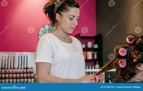 Hairdresser Curling Woman Hair In A Beauty Salon Stock Photo Image Of