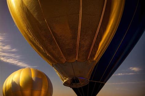 Premium AI Image A Couple Of Hot Air Balloons Flying In The Sky Generative AI