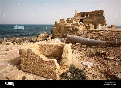 The Remains Of The Old Lighthouse At Leptis Magna Harbour In Libya