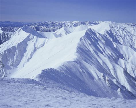 无人横图俯视室外白天旅游度假石头美景山山脉峡谷雪雪山大雪日本亚洲阴影光线纹路石子纹理影子冰积雪