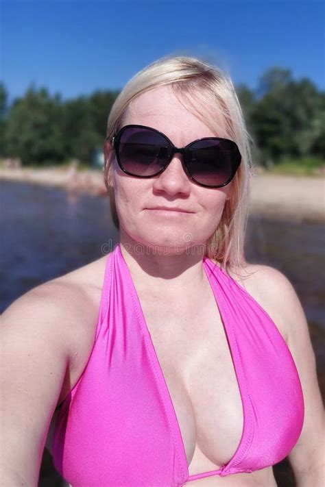 Woman In Pink Open Bikini Wearing Sunglasses On Beach Blurred Background Big Tits At Summer