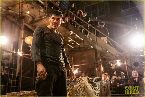 Henry Golding Begins His Training In The Action Packed Trailer For