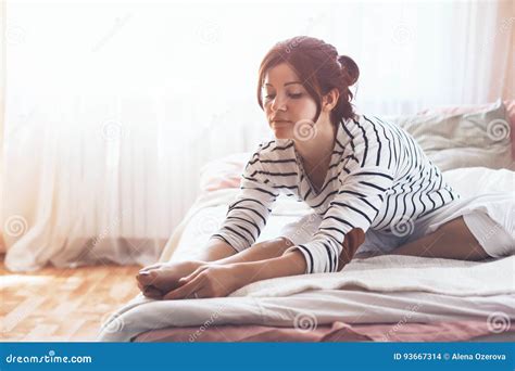 Woman Doing Yoga In The Bed Stock Photo Image Of Inside Energy 93667314