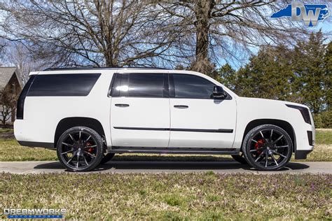 White Cadillac Escalade Black Lexanis — Dreamworks Motorsports