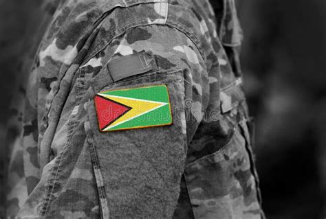 Flag of Guyana on Soldier Arm. Flag of Co-operative Republic of Stock ...