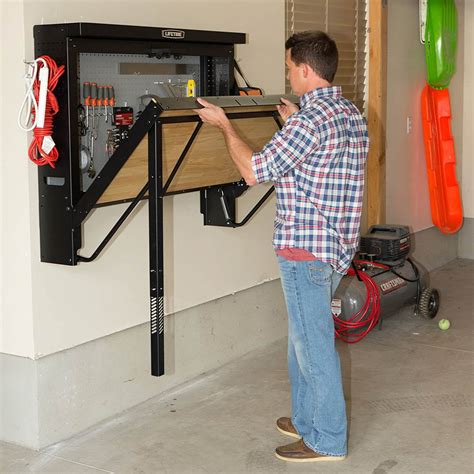 This Folding Garage Workbench Sticks Out Less Than a Foot When Not In Use