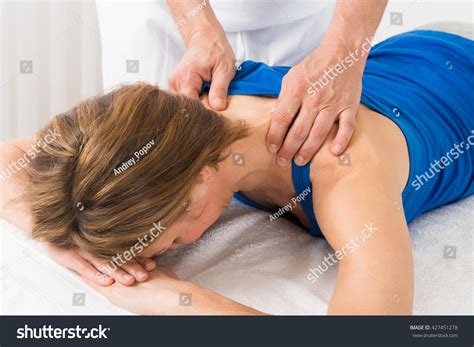 Close Up Person Giving Massage Mature Woman Stock Photo