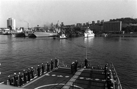 Crew Members Man The Rail At The Stern Of The Guided Missile Frigate