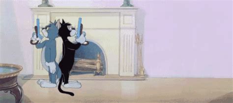 Tomn Jerry Gun GIF - TomnJerry Tom Jerry - Discover & Share GIFs