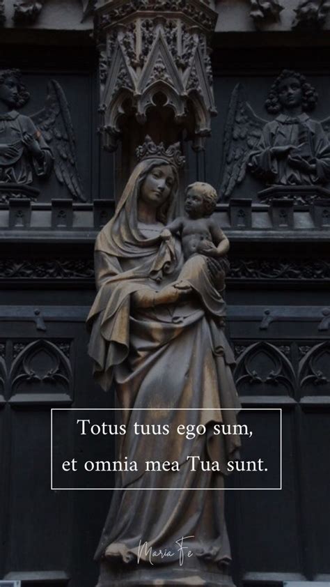 A Statue With A Quote On It That Says Totus Tus Go Sum Et Omnia Meat